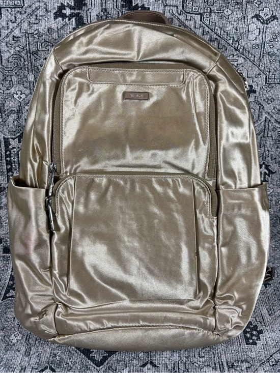 Tumi Handbags - Tumi Courtney Gold Laptop Backpack